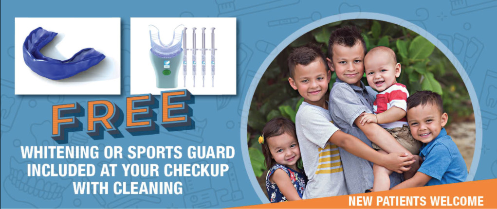 Free whitening or sports guard included at your checkup with cleaning. A group of children smiling.  New patients welcome